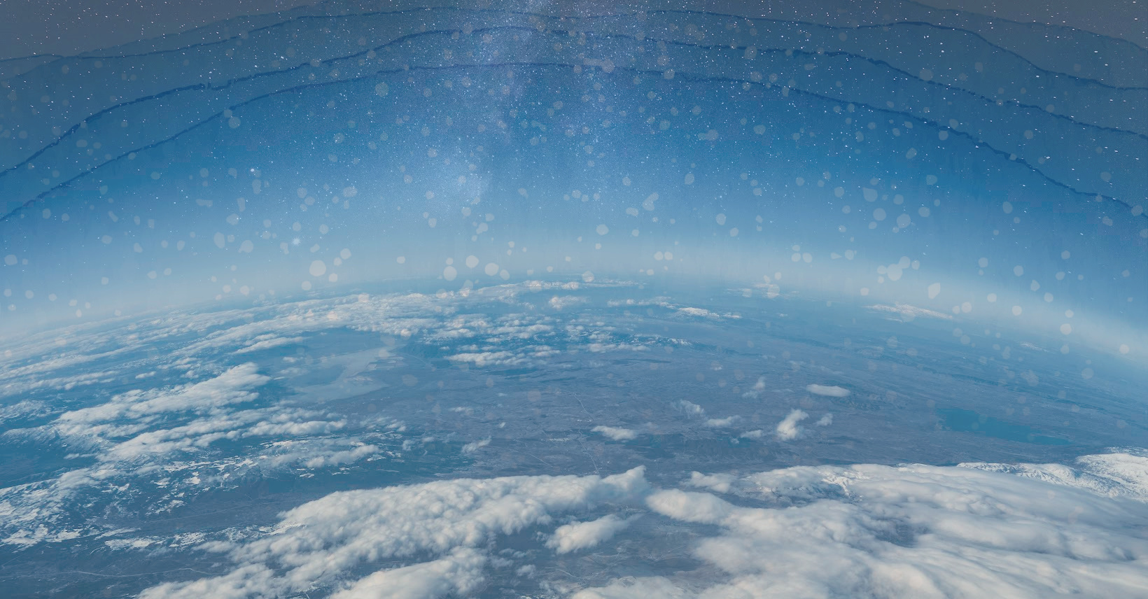 The Earth and clouds pictured in space